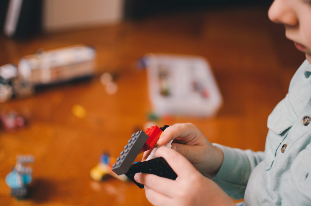 A child plays with legos