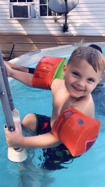 Wyatt swimming in the pool