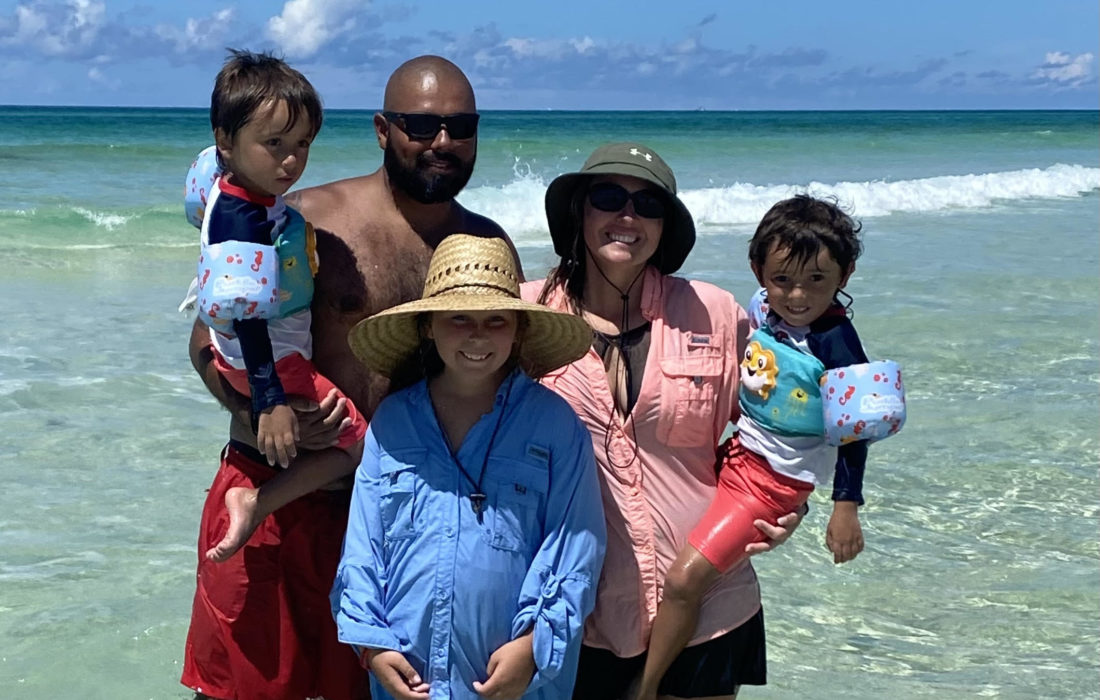 Cainan and his family at the beach